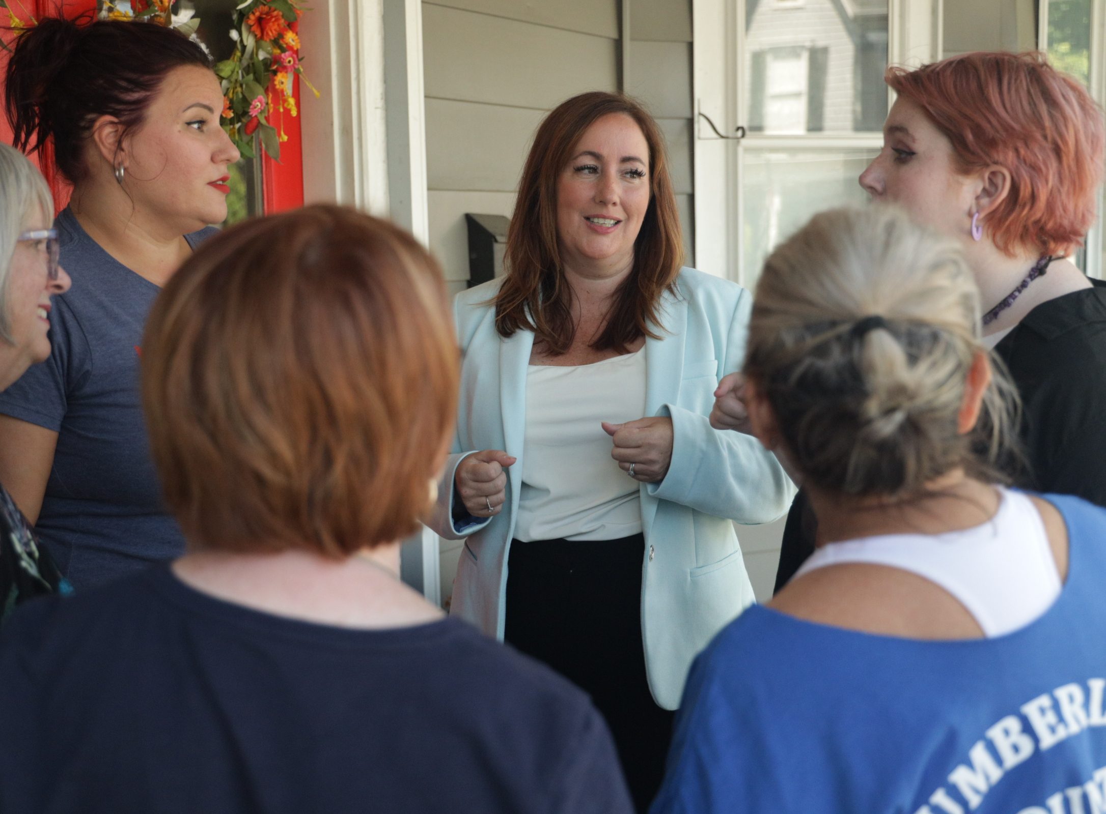 Sara discussing important issues with voters