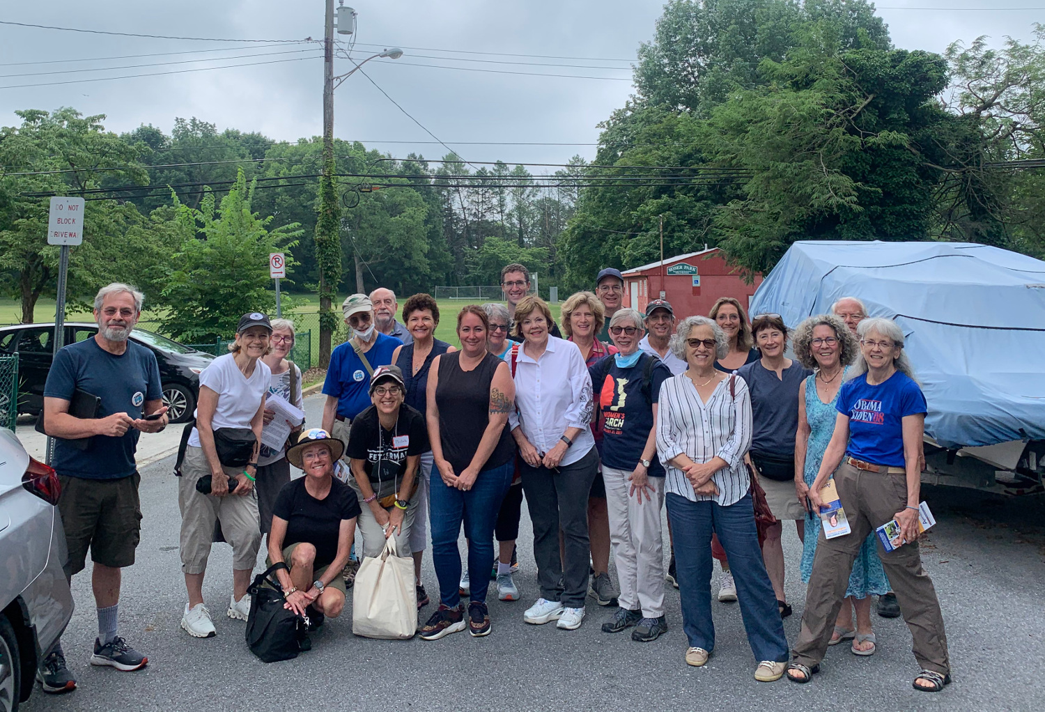 Volunteer with Sara!  Here Sara is shown with a large group of volunteers